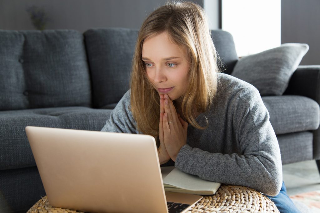 positive girl having video call and asking for help