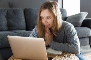 positive girl having video call and asking for help